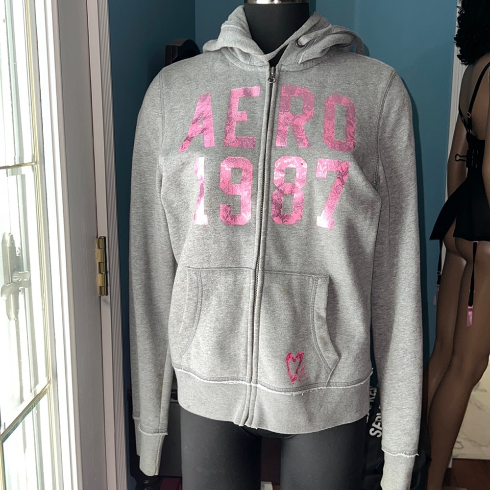 Vintage, hoodie. Across the front says “ Aeropostal Est 1987”.